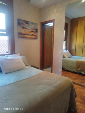 Quarto Suite -Em apartamento familiar